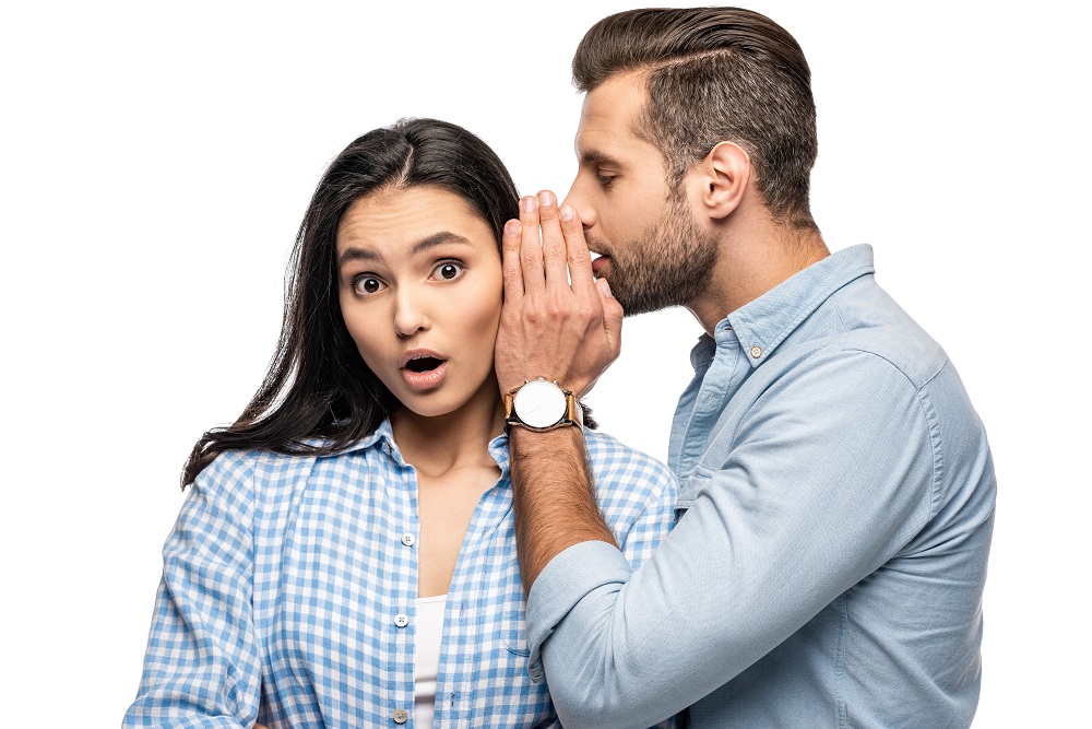 man telling secret to shocked young woman isolated 2022 11 03 09 48 28 utc