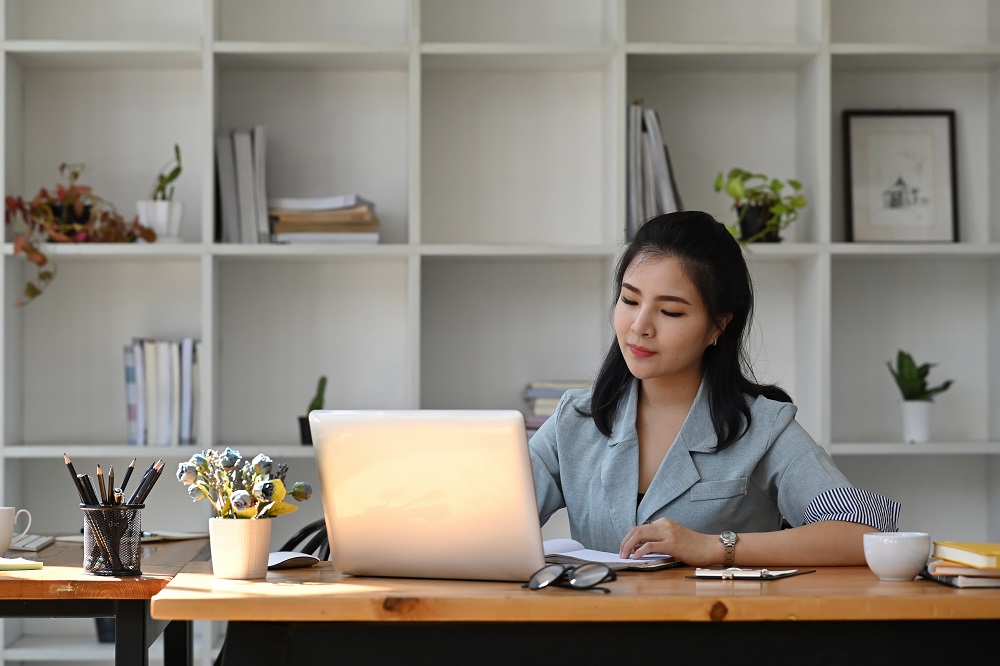 asian business woman using laptop computer at offi 2022 03 29 08 47 43 utc