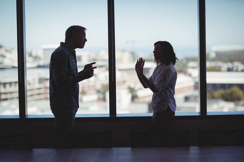 business couple arguing near the window 2021 08 28 17 56 10 utc